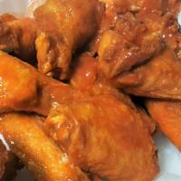 18 Buffalo Wings · Choice of sauce, served with celery, carrots and blue cheese or ranch dressing. 