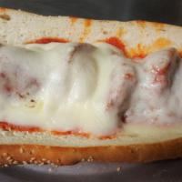Meatball Parmigiana Sandwich · Meatballs with marinara sauce covered with  oven-melted mozzarella cheese served on a long I...