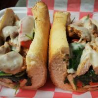 Marinated Chicken Italiano Sandwich · Grilled chicken breast with fire-roasted red peppers, sautéed  spinach and melted mozzarella...