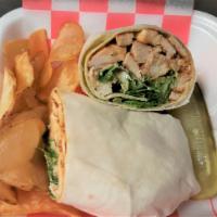 Grilled Chicken Caesar Wrap · Grilled chicken, house-made croutons, romaine lettuce, Caesar dressing and grated romano che...