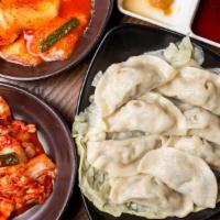 Mandu (Dumplings) (만두) · Homemade dumplings filled with vegetables, pork and beef. 7 pieces included.