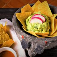 Fresh Guacamole · Made to order w/fresh lime, onions, tomatoes, cilantro & jalapenos. Served with chips and sa...
