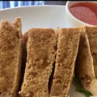 Fried Tofu  · 5 pieces of fried tofu served with sweet chili sauce.