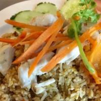 Crab Meat Fried Rice · Jumbo lump crab meat, stir-fried with jasmine rice, mixed vegetables, tomatoes, egg and swee...