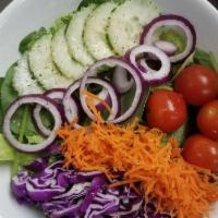 Garden Salad · Romaine, spinach, purple cabbage, carrots, cucumbers &  grape tomatoes. Vegan & gluten-free.