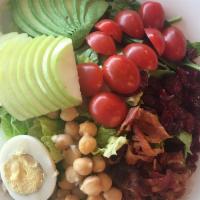 Chopped Salad · Romaine and spinach mixture, dried cranberries, chickpeas, egg, tomatoes, bacon, avocado, an...
