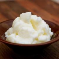 Garlic Sauce · Homemade creamy garlic dip with fresh lemon juice and canola oil. Vegan. 
