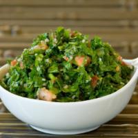 Tabbouli · Finely chopped parsley, tomato, green onion, fresh mint, burghul (wheat) lemon juice and oli...