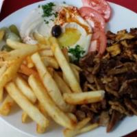 Beef Shawarma Platter · Thinly sliced and marinated beef shawarma served with hummos and french fries.