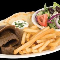 Gyro Platter · Sliced lamb gyro slices,  pita bread, tzatziki sauce,  plus served with Greek salad and fries 