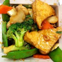 Buddha's Delight · Tofu, shitake mushroom, broccoli, zucchini, carrots, napa cabbage, and water chestnuts stir ...