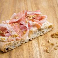 Focaccia Board · White focaccia with rosemary, extra virgin olive oil, grilled prosciutto and grilled mozzare...