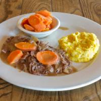 Classic Slow Cooked Pot Roast · We take our time and you can taste it. Our classic pot roast is slow roasted with carrots an...