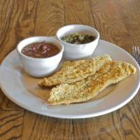 Catfish Fillets · Our tender fillets are prepared either grilled with our unique Cajun seasoning and served ov...