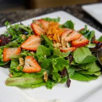 Strawberry Walnut Salad · Spring mix, homemade honeynut cheese spread and honey balsamic dressing.