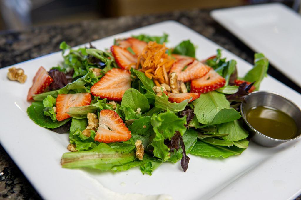 Strawberry Walnut Salad · Spring mix, homemade honeynut cheese spread and honey balsamic dressing.
