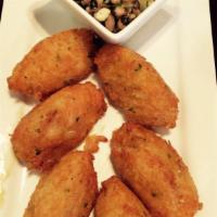 Pasteis de Bacalhau · Codfish croquettes with black eye peas.