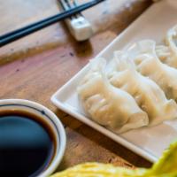 Steamed Dumplings · Dumplings with pork, chicken and vegetable filling.Side Ponzu sauce