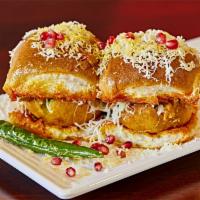 Vada Pav · 2 pieces. Batter fried spicy potato dumpling served in bun with sweet date chutney and spicy...