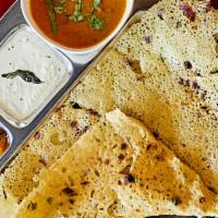 Rava Masala Dosa · Cracked wheat crepe filled with potatoes onions spices.