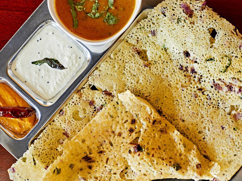 Rava Masala Dosa · Cracked wheat crepe filled with potatoes onions spices.