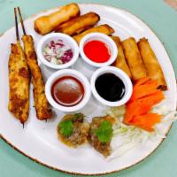 Combination Tray · Included 3 cheese rolls, 3 spring rolls, 2 dumplings, and 2 chicken satay.