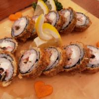 Playboy Roll · Cooked salmon, jalapeno, cream cheese, spicy mayo, and orange caviar