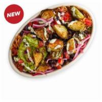 Spiced Brussels Bowl · Spiced Brussels sprouts, pickled red onion, Mexican rice, black beans, tomato salsa, and gua...