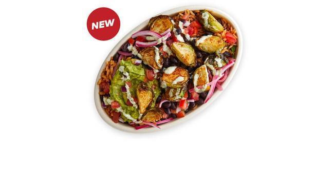 Spiced Brussels Bowl · Spiced Brussels sprouts, pickled red onion, Mexican rice, black beans, tomato salsa, and guac with a drizzle of Creamy Chile Verde