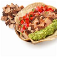 Pollo Asado Taco · Loaded tacos served in a soft corn tortilla