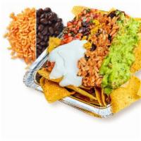 Rice & Bean Nachos · Corn tortilla chips loaded with melted cheese and choice of toppings