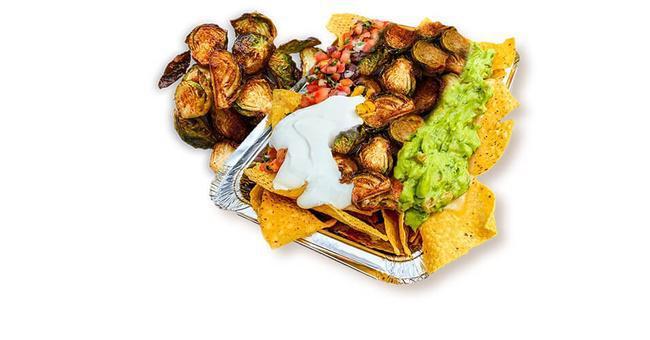 Brussels Nachos · Corn tortilla chips loaded with melted cheese and choice of toppings