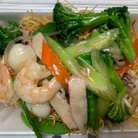 Seafood Combination over Noodles · Baby cuttlefish, imitation crabmeat, shrimp, squid, & mixed vegetables. 
