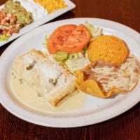 Casa Chimichanga · Choice of shredded chicken, chorizo, ground beef, barbacoa or pork carnitas. Topped with let...