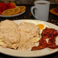 Biscuits and Gravy · Homemade fluffy biscuits smothered in savory sausage gravy. Add 2 eggs, 2 slices of bacon or...