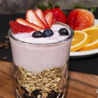 Breakfast Salad · Strawberry yogurt, granola, blueberries and fresh strawberries.