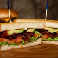 BLT with Avocado Sandwich · White bread, mayonnaise, lettuce, tomatoes, bacon and avocado.