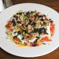El Triunfo Black Bean Salad · Lettuce, pico de gallo, falafel, guacamole, onions and black beans.