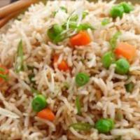 Vegetable Fried Rice · A Chinese style vegetable rice dish cooked with green peas, cabbage carrots and bell peppers...