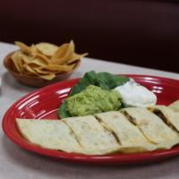 Cheese and Meat Quesadilla · Served with guacamole, sour cream and pico de gallo on the side.