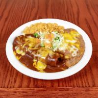 6. Beefy Cheese Enchilada, Rice & Beans Lunch Special · Your choice of ground beef, chicken, or machaca for $1.00 more inside a cheese enchilada wit...