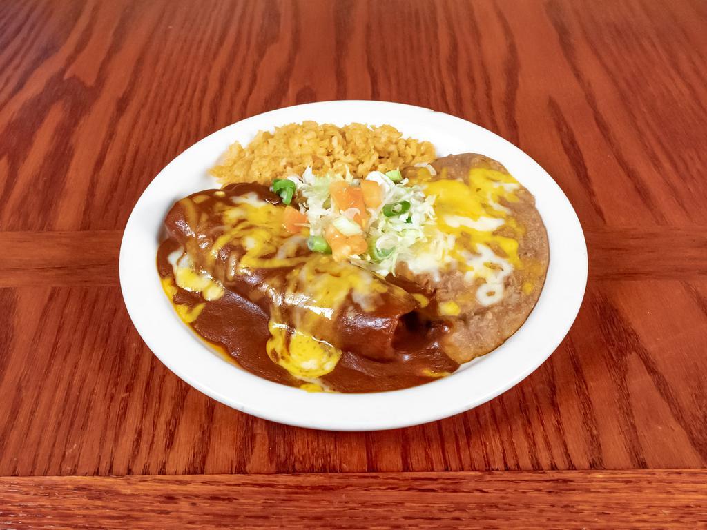 6. Beefy Cheese Enchilada, Rice & Beans Lunch Special · Your choice of ground beef, chicken, or machaca for $1.00 more inside a cheese enchilada with a side of rice and beans