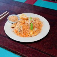 61. Pad Thai Noodles with Chicken · Pan-fried rice noodle, with chicken, egg, fried tofu, bean sprouts, green onions and ground ...