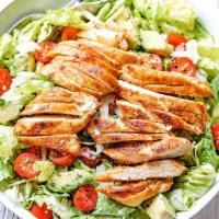 Chicken Over Salad · Authentic chicken recipe on a bed of saffron rice, side of tzatziki, green salad, and a choi...