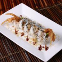 Spider Roll · Soft shell crab tempura, crab meat, avocado, cucumber, radish sprout, gobo eel sauce, and po...