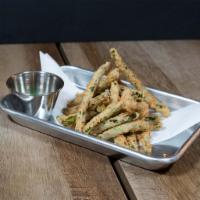Fried Green Beans · Hand breaded green beans fried in wagyu tallow.