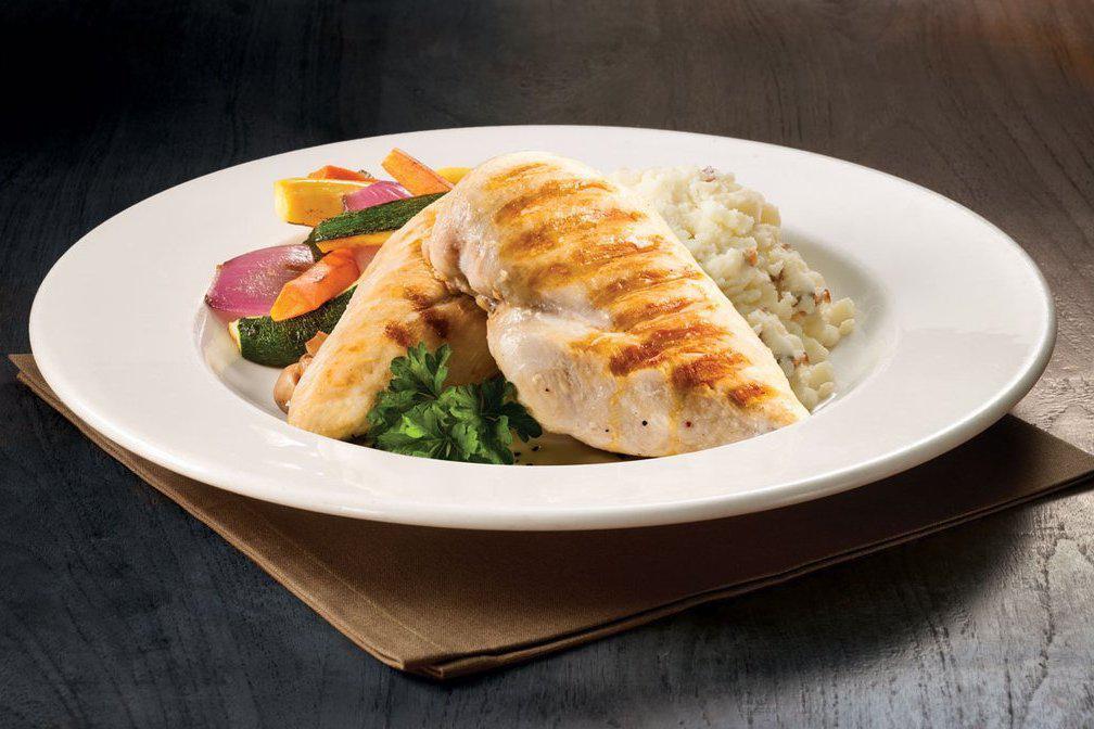 Fire Grilled Chicken  · Grilled chicken breast, mashed potatoes, roasted vegetables.