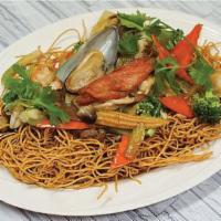 128. Mi Xao Gion Do Bien · Combo seafood chow mein. Crispy fried noodles with seafood with mixed vegetables.