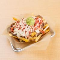 Carne Asada Fries · Fries, cheese sauce, plant-based steak, pico de gallo, guacamole, and chipotle sour cream. G...