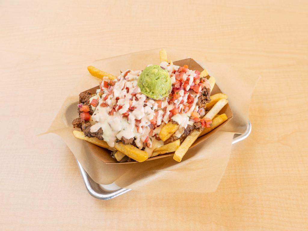Carne Asada Fries · Fries, cheese sauce, plant-based steak, pico de gallo, guacamole, and chipotle sour cream. Gluten free style available upon request.